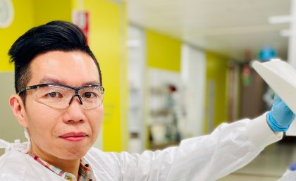 Closeup of Professor Di Yu in a laboratory setting